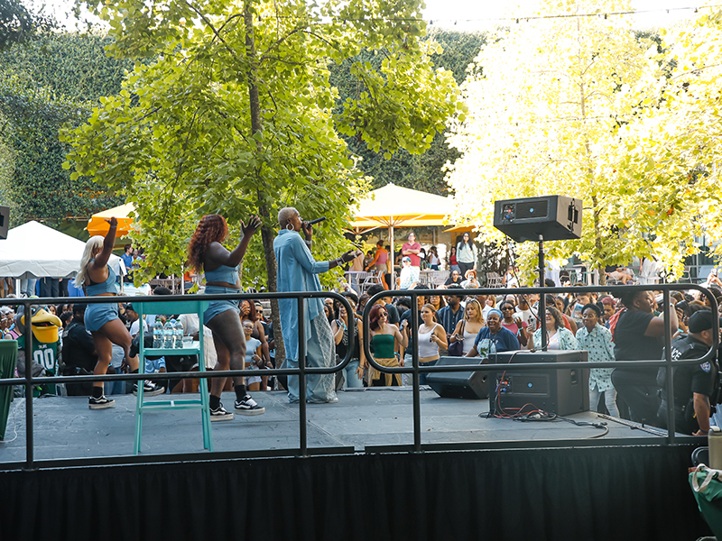 Big Freedia performs on stage for a crowd at commUNITY 2026.