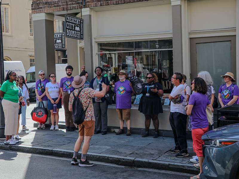 Tulane Pride 2025 attendees take a Pride walking tour of the French Quarter.
