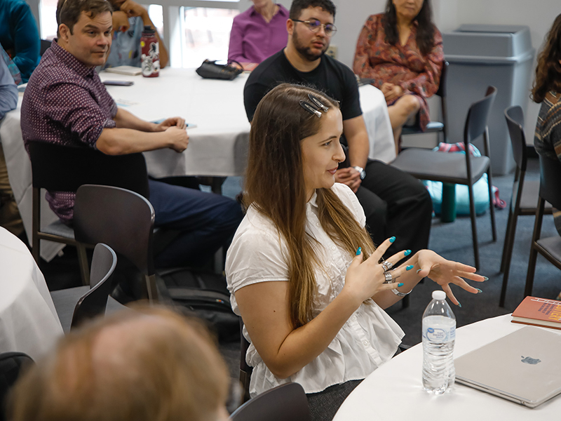 A Tulanian asks a question during a Booked! workshop.