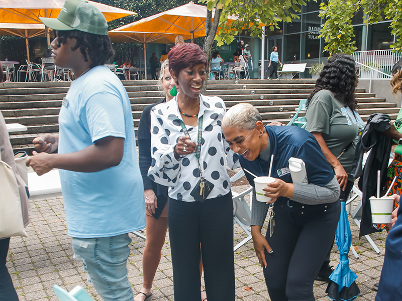 Two Tulanians laugh together during Juneteenth on Tulane's Uptown campus.