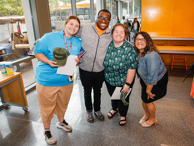 Four Tulanians pose for a group photo during Juneteenth on Tulane's Uptown campus.